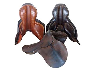 Old Worn Leather Saddles for Hire